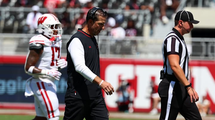 Sep 13, 2025; Tuscaloosa, Alabama, USA; Wisconsin Badgers head coach Luke Fickell walks to the sideline during the second quarter against the Alabama Crimson Tide at Saban Field at Bryant-Denny Stadium. Mandatory Credit: David Leong-Imagn Images