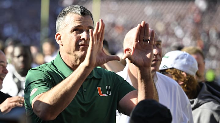 Miami head coach Mario Cristobal celebrates after defeating Texas A&M in the first round game of the College Football Playoff.