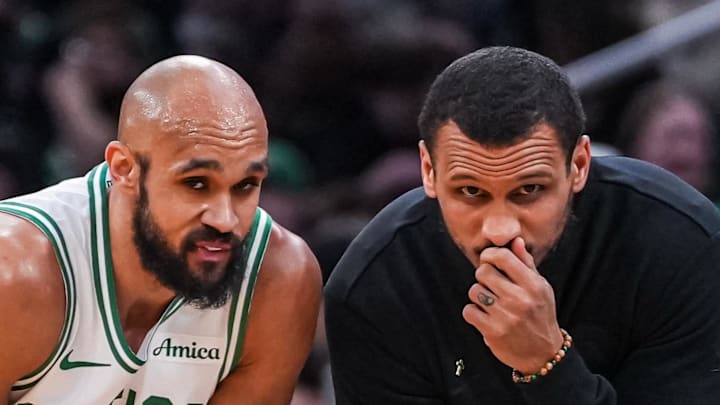 Apr 7, 2026; Boston, Massachusetts, USA; Boston Celtics head coach Joe Mazzulla with guard Derrick White (9) from the sideline as they take on the Charlotte Hornets at TD Garden. Mandatory Credit: David Butler II-Imagn Images