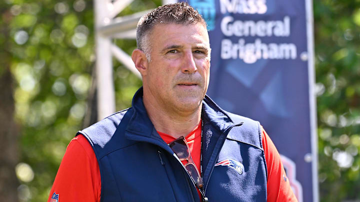 Jul 28, 2025; Foxborough, MA, USA; New England Patriots head coach Mike Vrabel heads to the practice fields for training camp at Gillette Stadium. Mandatory Credit: Eric Canha-Imagn Images