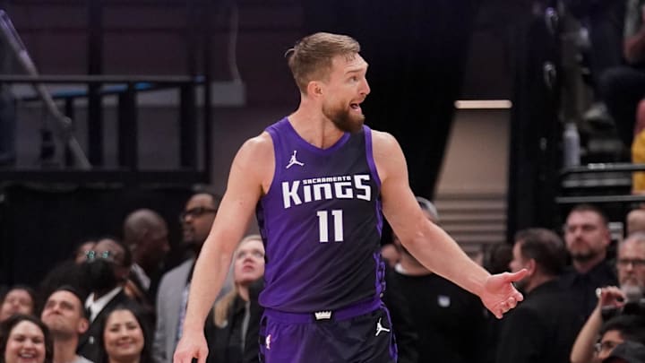 Mar 24, 2025; Sacramento, California, USA; Sacramento Kings center Domantas Sabonis (11) reacts after the Kings made a basket while being fouled against the Boston Celtics in the first quarter at the Golden 1 Center. Mandatory Credit: Cary Edmondson-Imagn Images