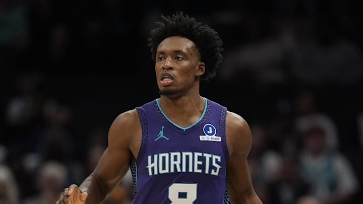 Nov 2, 2025; Charlotte, North Carolina, USA; Charlotte Hornets guard Collin Sexton (8) brings the ball up court against the Utah Jazz during the second quarter at Spectrum Center. Mandatory Credit: Jim Dedmon-Imagn Images