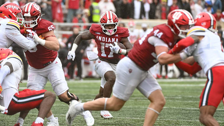 Indiana Hoosiers running back Ty Son Lawton (17) runs for a touchdown against the Maryland Terrapins at Memorial Stadium. Indiana Hoosiers running back Ty Son Lawton (17) runs for a touchdown against the Maryland Terrapins at Memorial Stadium.