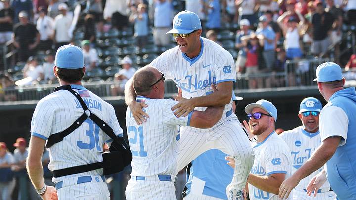 June 7, 2026; Chapel Hill, NC, USA;  North Carolina Tar Heels head coach Scott Forbes celebrates a win with the coaching staff against the USC Trojans at Boshamer Stadium. Mandatory Credit: Zachary Taft-Imagn Images