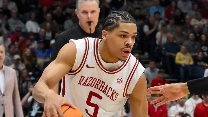 Mar 15, 2026; Nashville, TN, USA; Arkansas Razorbacks guard Darius Acuff Jr. (5) drives to the basket past Vanderbilt Commodores forward Devin McGlockton (99) during the first half during the men's SEC Conference Tournament Championship at Bridgestone Arena. Mandatory Credit: Steve Roberts-Imagn Images Mar 15, 2026; Nashville, TN, USA; Arkansas Razorbacks guard Darius Acuff Jr. (5) drives to the basket past Vanderbilt Commodores forward Devin McGlockton (99) during the first half during the men's SEC Conference Tournament Championship at Bridgestone Arena. Mandatory Credit: Steve Roberts-Imagn Images
