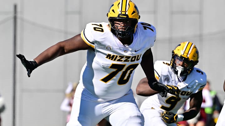 Oct 12, 2024; Amherst, Massachusetts, USA; Missouri Tigers offensive lineman Cayden Green (70) in action during the second half against the Massachusetts Minutemen at Warren McGuirk Alumni Stadium. Mandatory Credit: Eric Canha-Imagn Images