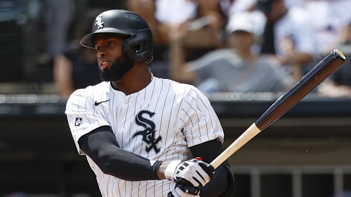 Aug 24, 2025; Chicago, Illinois, USA; Chicago White Sox center fielder Luis Robert Jr. (88) singles against the Minnesota Twins during the first inning at Rate Field. 