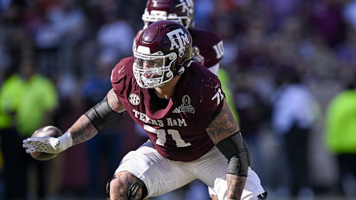 Dec 20, 2025; College Station, TX, USA; Texas A&M Aggies offensive lineman Chase Bisontis (71) blocks the rush during the game between the Aggies and the Hurricanes at Kyle Field. Dec 20, 2025; College Station, TX, USA; Texas A&M Aggies offensive lineman Chase Bisontis (71) blocks the rush during the game between the Aggies and the Hurricanes at Kyle Field.