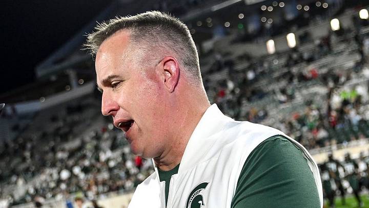 Michigan State’s head coach Pat Fitzgerald, right, shakes hands with Nebraska head coach Matt Rhule after the game on Saturday, Sept. 26, 2026, in East Lansing. Michigan State’s head coach Pat Fitzgerald, right, shakes hands with Nebraska head coach Matt Rhule after the game on Saturday, Sept. 26, 2026, in East Lansing.