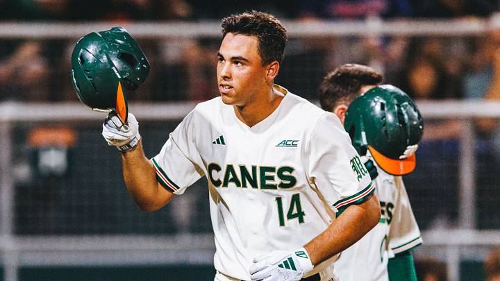 Miami Hurricanes third baseman Daniel Cuvet launches a ball out of the park for a home run against Notre Dame. Miami Hurricanes third baseman Daniel Cuvet launches a ball out of the park for a home run against Notre Dame.
