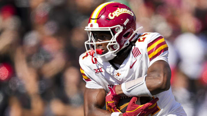 Oct 4, 2025; Cincinnati, Ohio, USA;  Iowa State Cyclones running back Abu Sama (24) carries the ball against the Cincinnati Bearcats in the second half at Nippert Stadium. 