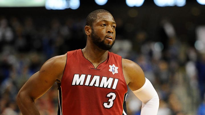 Dec 25, 2011; Dallas, TX, USA; Miami Heat shooting guard Dwyane Wade (3) takes a break from facing the Dallas Mavericks during their game at the American Airlines Center. The Heat defeated the Mavericks 105-94. Mandatory Credit: Jerome Miron-Imagn Images