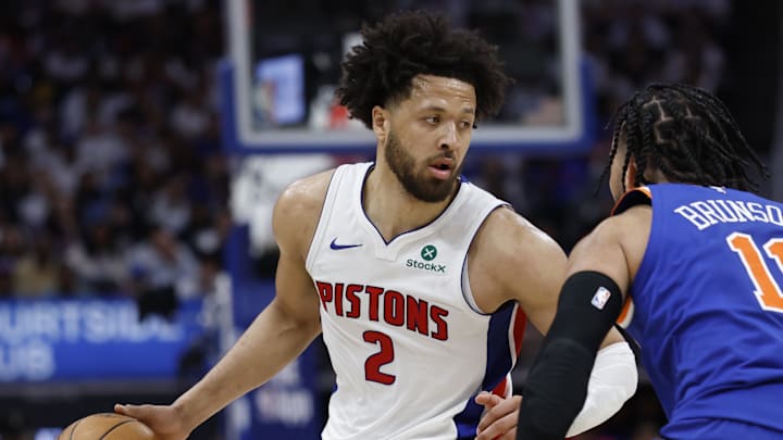 Apr 24, 2025; Detroit, Michigan, USA; Detroit Pistons guard Cade Cunningham (2) dribbles defended by New York Knicks guard Jalen Brunson (11) in the second half during game three of first round for the 2024 NBA Playoffs at Little Caesars Arena. Mandatory Credit: Rick Osentoski-Imagn Images