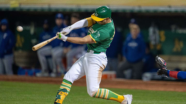 Sep 24, 2024; Oakland, California, USA; Oakland Athletics first baseman Tyler Soderstrom (21) hits a ground rule double against the Texas Rangers during the sixth inning at Oakland-Alameda County Coliseum. Mandatory Credit: Neville E. Guard-Imagn Images Sep 24, 2024; Oakland, California, USA; Oakland Athletics first baseman Tyler Soderstrom (21) hits a ground rule double against the Texas Rangers during the sixth inning at Oakland-Alameda County Coliseum. Mandatory Credit: Neville E. Guard-Imagn Images
