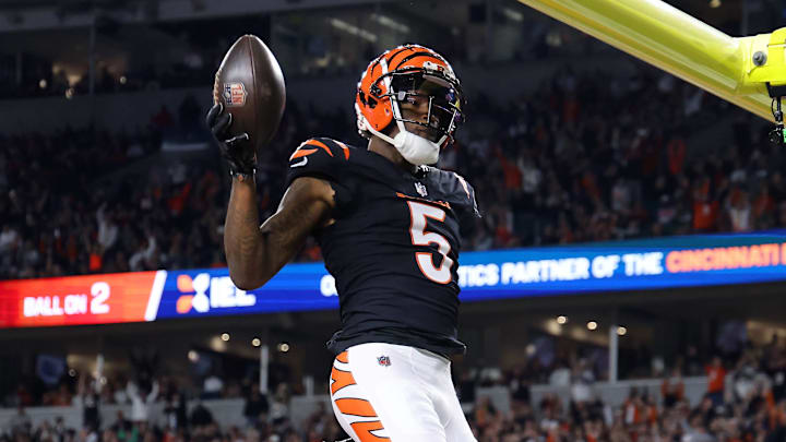 Dec 28, 2024; Cincinnati, Ohio, USA;  Cincinnati Bengals wide receiver Tee Higgins (5) celebrates after making a touchdown pass reception against the Denver Broncos during the second quarter at Paycor Stadium. Mandatory Credit: Joseph Maiorana-Imagn Images