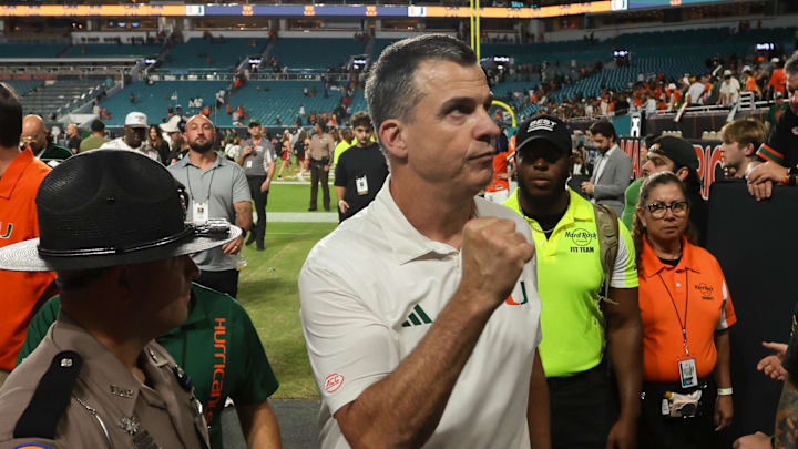 Nov 15, 2025; Miami Gardens, Florida, USA; Miami Hurricanes head coach Mario Cristobal reacts after the game against NC State Wolfpack at Hard Rock Stadium. Mandatory Credit: Sam Navarro-Imagn Images