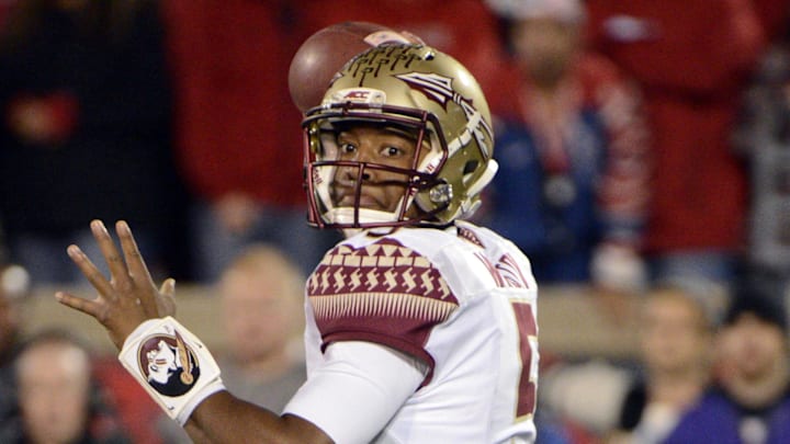 Oct 30, 2014; Louisville, KY, USA; Florida State Seminoles quarterback Jameis Winston (5) looks to pass against the Louisville Cardinals during the second half at Papa John's Cardinal Stadium. Florida State defeated Louisville 42-31. Mandatory Credit: Jamie Rhodes-Imagn Images Oct 30, 2014; Louisville, KY, USA; Florida State Seminoles quarterback Jameis Winston (5) looks to pass against the Louisville Cardinals during the second half at Papa John's Cardinal Stadium. Florida State defeated Louisville 42-31. Mandatory Credit: Jamie Rhodes-Imagn Images