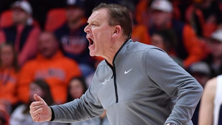 Illinois Fighting Illini coach Brad Underwood instructs his team against the Minnesota Golden Gophers at State Farm Center. 