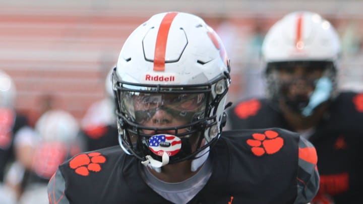 Offensive lineman Jack Carlson of Brighton warms up before a season-opening football game against Dexter on Thursday, Aug. 28, 2025 at Brighton. Offensive lineman Jack Carlson of Brighton warms up before a season-opening football game against Dexter on Thursday, Aug. 28, 2025 at Brighton.