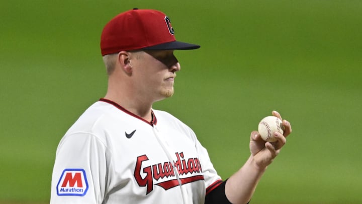 Apr 16, 2026; Cleveland, Ohio, USA; Cleveland Guardians starting pitcher Parker Messick (77) looks at the ball after giving up his first hit of the game in the ninth inning against the Baltimore Orioles at Progressive Field. Mandatory Credit: David Richard-Imagn Images