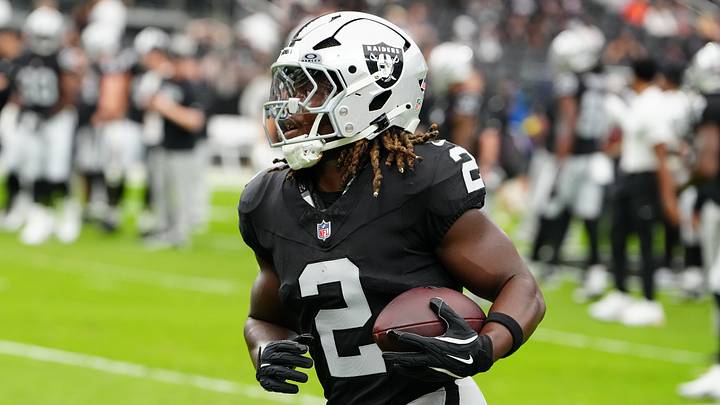 Las Vegas Raiders running back Ashton Jeanty (2) warms up before the game against the Chicago Bears at Allegiant Stadium. Las Vegas Raiders running back Ashton Jeanty (2) warms up before the game against the Chicago Bears at Allegiant Stadium.
