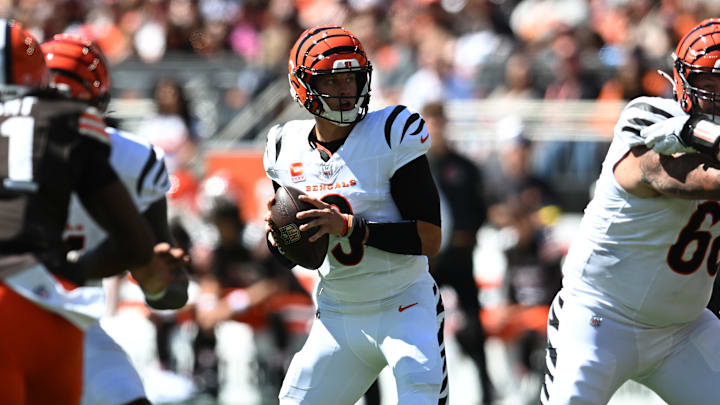Sep 7, 2025; Cleveland, Ohio, USA; Cincinnati Bengals quarterback Joe Burrow (9) drops to throw during the first half against the Cleveland Browns at Huntington Bank Field. Mandatory Credit: Ken Blaze-Imagn Images