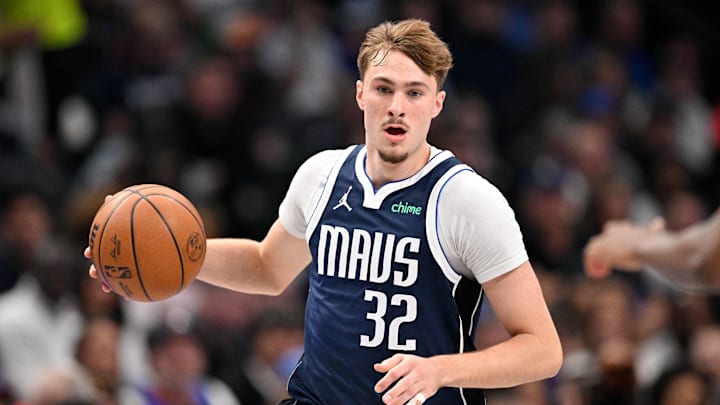 Jan 1, 2026; Dallas, Texas, USA; Dallas Mavericks forward Cooper Flagg (32) brings the ball up court against the Philadelphia 76ers during the second quarter at the American Airlines Center. Mandatory Credit: Jerome Miron-Imagn Images