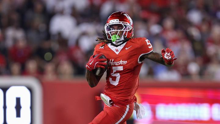 Sep 12, 2025; Houston, Texas, USA; Houston Cougars wide receiver Stephon Johnson (5) runs with the ball during the third quarter against the Colorado Buffaloes at TDECU Stadium. Mandatory Credit: Troy Taormina-Imagn Images Sep 12, 2025; Houston, Texas, USA; Houston Cougars wide receiver Stephon Johnson (5) runs with the ball during the third quarter against the Colorado Buffaloes at TDECU Stadium. Mandatory Credit: Troy Taormina-Imagn Images