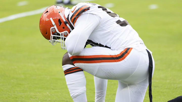 Aug 10, 2024; Cleveland, Ohio, USA; Cleveland Browns defensive end Ogbo Okoronkwo (54) kneels before the game against the Green Bay Packers at Cleveland Browns Stadium. Mandatory Credit: Scott Galvin-Imagn Images Aug 10, 2024; Cleveland, Ohio, USA; Cleveland Browns defensive end Ogbo Okoronkwo (54) kneels before the game against the Green Bay Packers at Cleveland Browns Stadium. Mandatory Credit: Scott Galvin-Imagn Images
