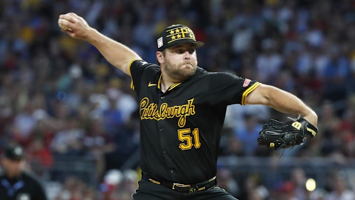 Jul 20, 2024; Pittsburgh, Pennsylvania, USA;  Pittsburgh Pirates relief pitcher David Bednar (51) throws against the Philadelphia Phillies during the ninth inning at PNC Park. The Pirates won 4-1.