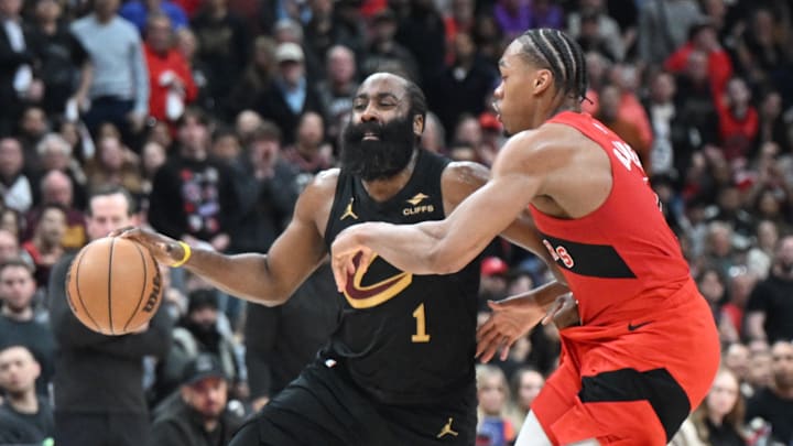 Apr 26, 2026; Toronto, Ontario, CAN;  Cleveland Cavaliers guard James Harden (1) tries to dribble the ball past Toronto Raptors forward Scottie Barnes (4) during game four of the first round of the 2026 NBA Playoffs at Scotiabank Arena. Mandatory Credit: Dan Hamilton-Imagn Images