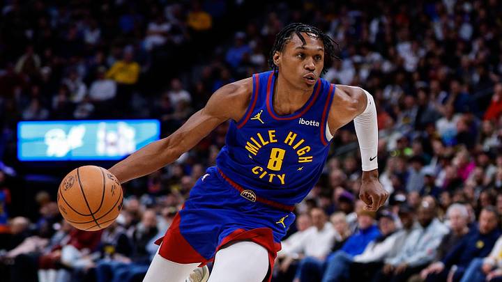 Feb 1, 2026; Denver, Colorado, USA; Denver Nuggets guard Peyton Watson (8) controls the ball in the third quarter against the Oklahoma City Thunder at Ball Arena. Mandatory Credit: Isaiah J. Downing-Imagn Images