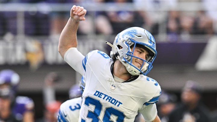  Detroit Lions place kicker Jake Bates (39) reacts after kicking the game winning field goal late during the fourth quarter against the Minnesota Vikings at U.S. Bank Stadium. 