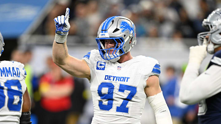 Dec 4, 2025; Detroit, Michigan, USA; Detroit Lions defensive end Aidan Hutchinson (97) reacts after a play during the second half against the Dallas Cowboys at Ford Field. Mandatory Credit: Lon Horwedel-Imagn Images
