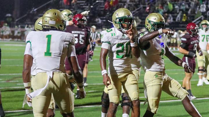 Buford's Braylon Williams celebrates with teammate Jameer Cantrell after Cantrell scored the first touchdown of the game during Benedictine's home opener on Friday, August 22, 2025 at Memorial Stadium. Buford's Braylon Williams celebrates with teammate Jameer Cantrell after Cantrell scored the first touchdown of the game during Benedictine's home opener on Friday, August 22, 2025 at Memorial Stadium.