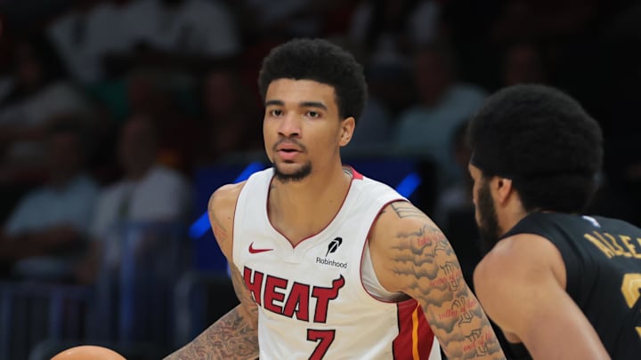 Apr 26, 2025; Miami, Florida, USA; Miami Heat center Kel'el Ware (7) dribbles the basketball as Cleveland Cavaliers center Jarrett Allen (31) defends in the third quarter during game three for the first round of the 2025 NBA Playoffs at Kaseya Center. Mandatory Credit: Sam Navarro-Imagn Images Apr 26, 2025; Miami, Florida, USA; Miami Heat center Kel'el Ware (7) dribbles the basketball as Cleveland Cavaliers center Jarrett Allen (31) defends in the third quarter during game three for the first round of the 2025 NBA Playoffs at Kaseya Center. Mandatory Credit: Sam Navarro-Imagn Images