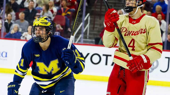 Michigan's Cole McKinney celebrates as the No. 2-ranked Wolverines completed a weekend sweep at No. 1 Denver in college hockey. Michigan's Cole McKinney celebrates as the No. 2-ranked Wolverines completed a weekend sweep at No. 1 Denver in college hockey.
