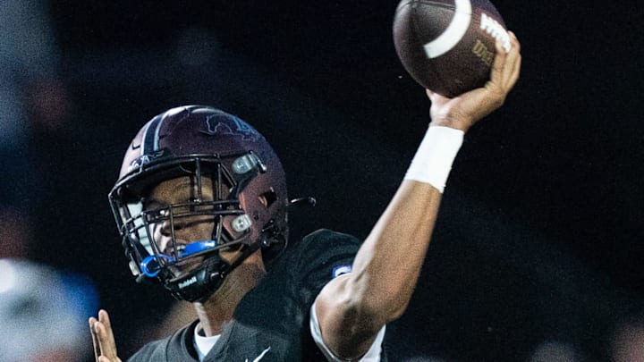 Lipscomb's Deuce Knight (2) throws downfield against IMG at Lipscomb's Reese Smith Football Field in Nashville, Tenn., Friday night, Aug. 18, 2023.