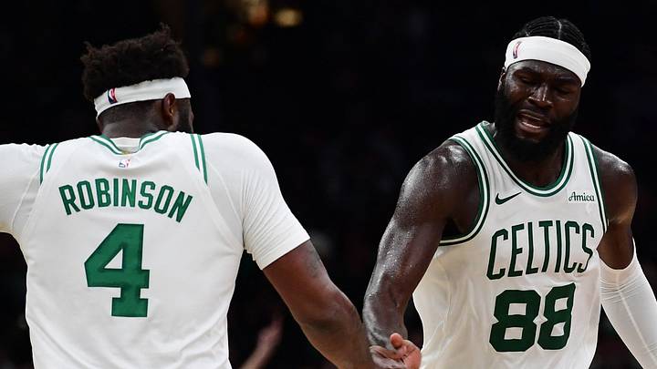 Oct 14, 2026; Boston, Massachusetts, USA; Boston Celtics center Neemias Queta (88) is congratulated by Boston Celtics center Mitchell Robinson (4) after making a basket during the second half against the Charlotte Hornets at TD Garden. Mandatory Credit: Bob DeChiara-Imagn Images Oct 14, 2026; Boston, Massachusetts, USA; Boston Celtics center Neemias Queta (88) is congratulated by Boston Celtics center Mitchell Robinson (4) after making a basket during the second half against the Charlotte Hornets at TD Garden. Mandatory Credit: Bob DeChiara-Imagn Images