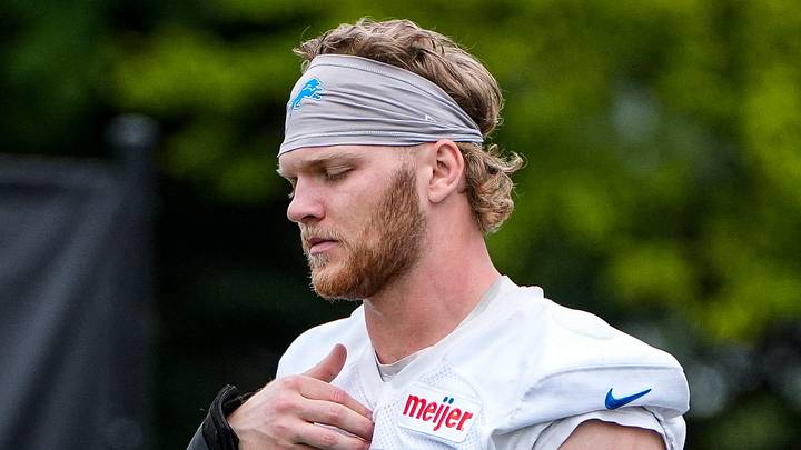 Detroit Lions defensive end Aidan Hutchinson (97) walks on to the field before practice during mini camp at Meijer Performance Center in Allen Park on Wednesday, June 17, 2026.
