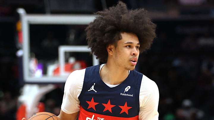 Jan 22, 2026; Washington, District of Columbia, USA; Washington Wizards forward Kyshawn George (18) drives past Denver Nuggets guard Peyton Watson (8) during the first half at Capital One Arena. Mandatory Credit: Daniel Kucin Jr.-Imagn Images