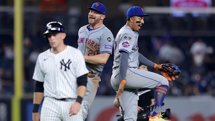 New York Mets first baseman Pete Alonso and third baseman Mark Vientos celebrate after defeating their crosstown rivals.