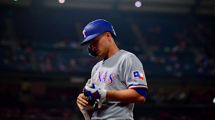 Texas Rangers shortstop Corey Seager (5) returns to the dugout.