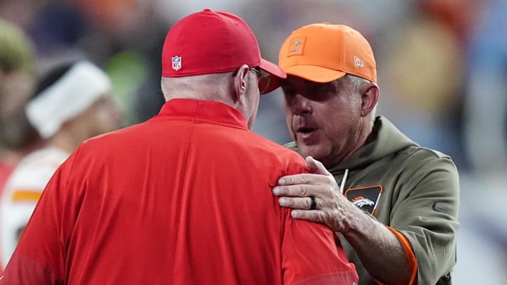 Nov 16, 2025; Denver, Colorado, USA; Denver Broncos head coach Sean Payton greets Kansas City Chiefs head coach Andy Reid following the game at Mile High. Mandatory Credit: Ron Chenoy-Imagn Images