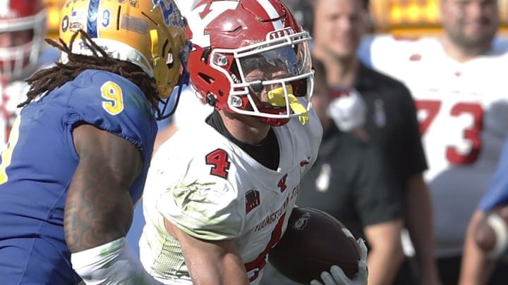 Youngstown State Penguins wide receiver Max Tomczak (4) runs after a catch against Pittsburgh.