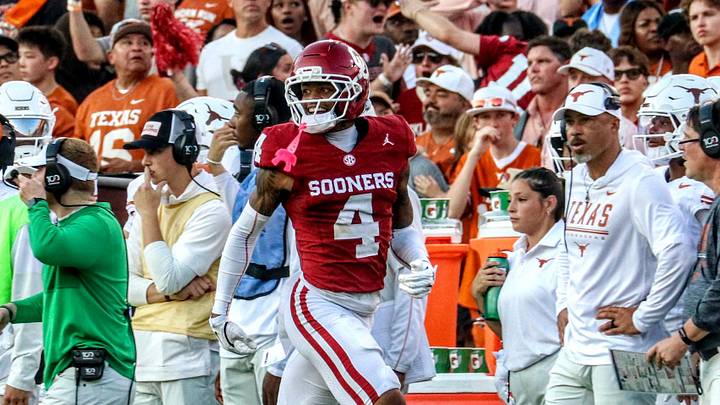 Oklahoma defensive back Courtland Guillory celebrates after logging an interception against Texas. Oklahoma defensive back Courtland Guillory celebrates after logging an interception against Texas.