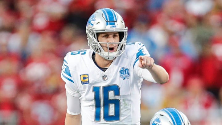 Detroit Lions quarterback Jared Goff (16) talks to center Frank Ragnow (77) before a snap against the 49ers Detroit Lions quarterback Jared Goff (16) talks to center Frank Ragnow (77) before a snap against the 49ers