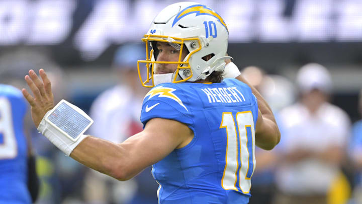 Sep 29, 2024; Inglewood, California, USA;  Los Angeles Chargers quarterback Justin Herbert (10) throws a pass in the first half against the Kansas City Chiefs at SoFi Stadium. Mandatory Credit: Jayne Kamin-Oncea-Imagn Images