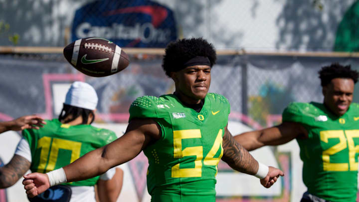 Oregon inside linebacker Jerry Mixon works out as the Oregon Ducks practice at Barry University ahead of the Orange Bowl on Dec. 30, 2025, in Miami, Florida.