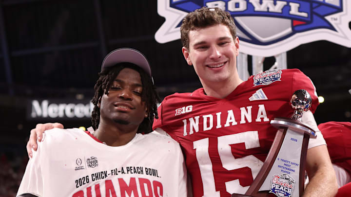 Indiana Hoosiers quarterback Fernando Mendoza and Indiana Hoosiers defensive back D'Angelo Ponds